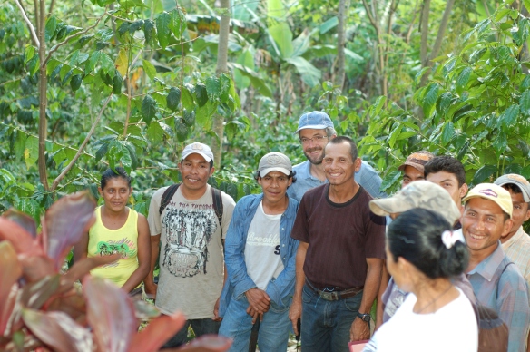 Workers who are part of the Fair Trade committee at a farm in Nicaragua meet with a member of Fair Trade USA’s board